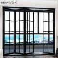 Aluminum black folding door with grill design inside double safety glass